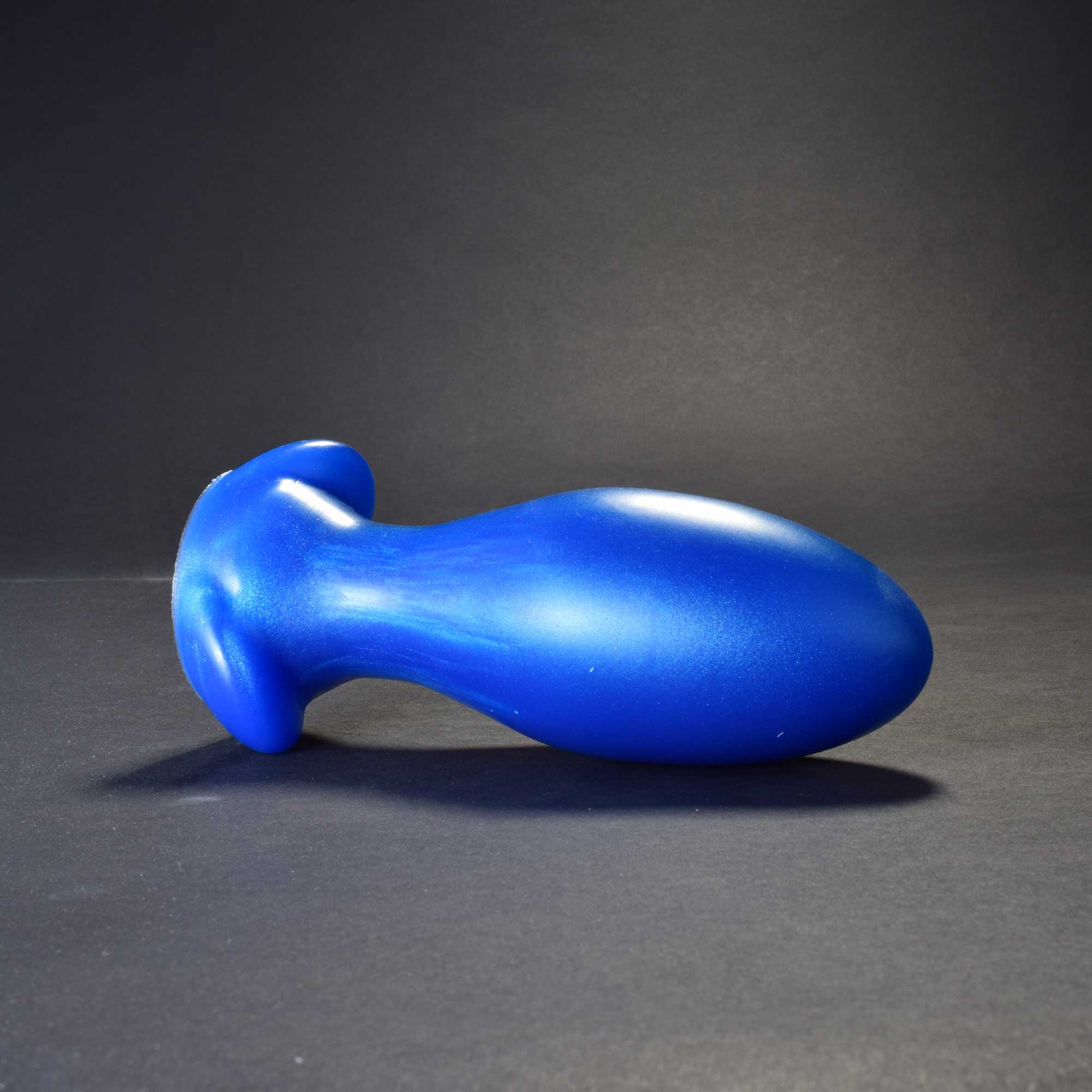 Gape Keeper 75 in Blue Steel laying on its side