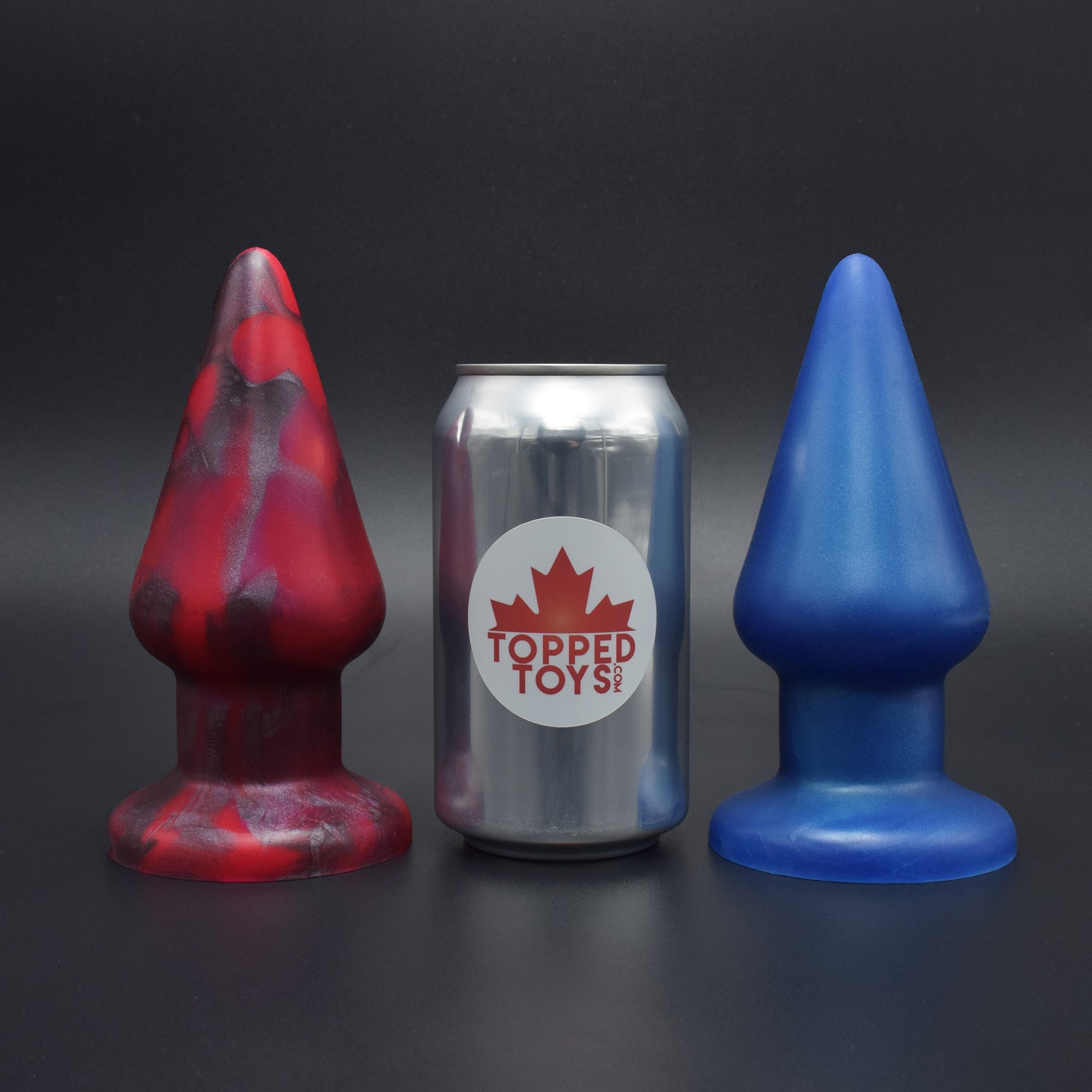 Grip 80 in Forge Red and Blue Steel, next to pop can with Topped Toys logo