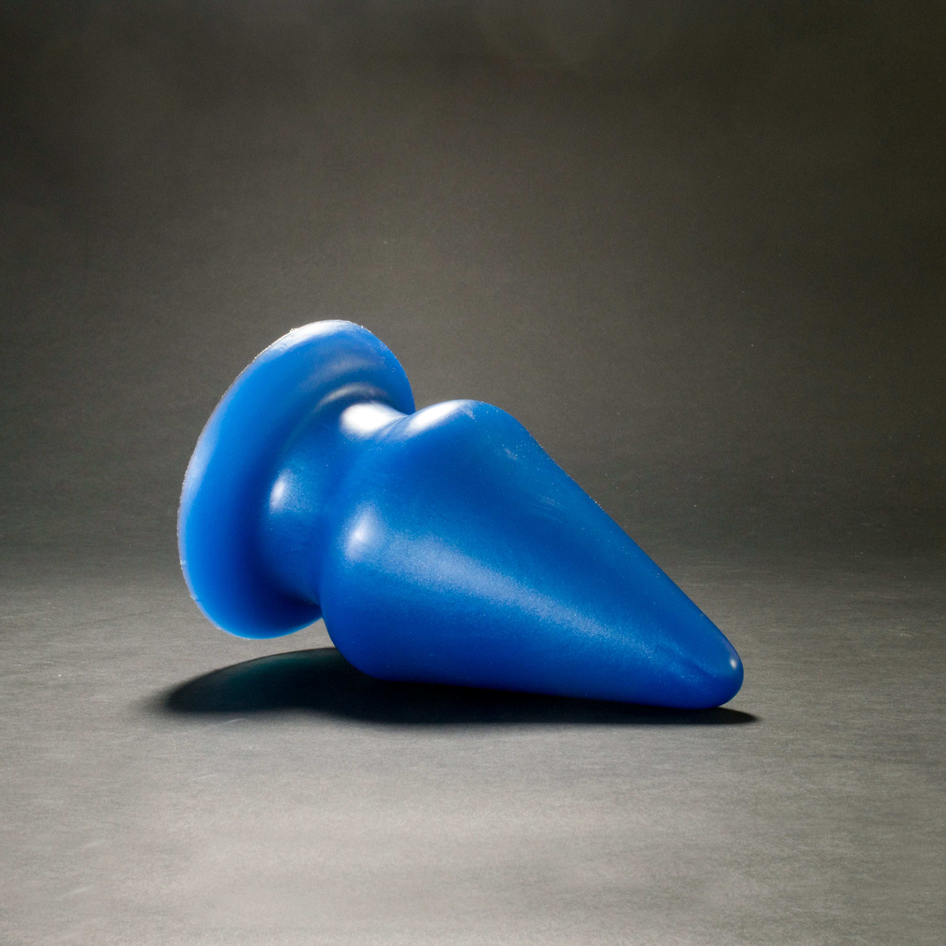 Grip 134 in Blue Steel laying on its side