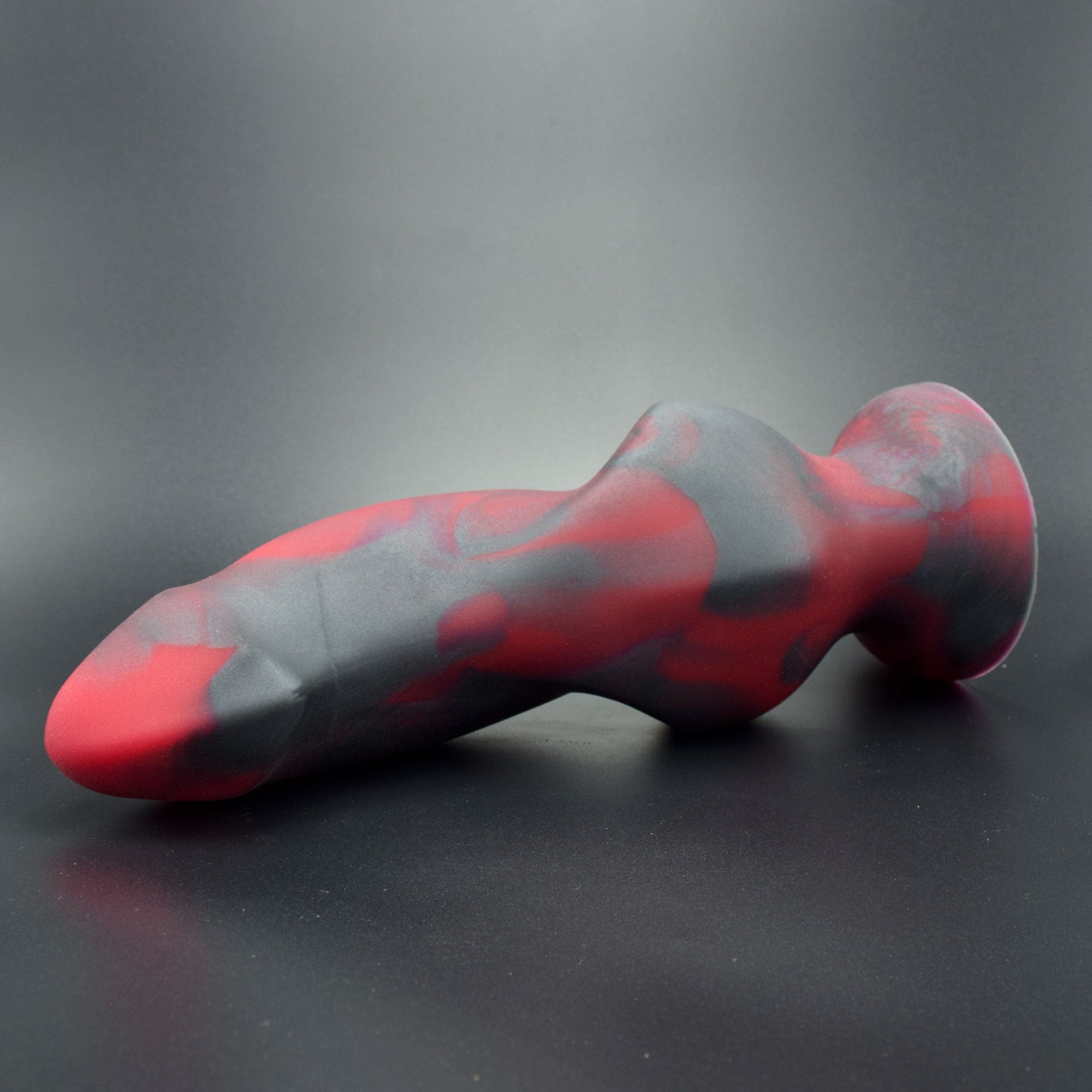 Hilt 125 in Forge Red laying on its side