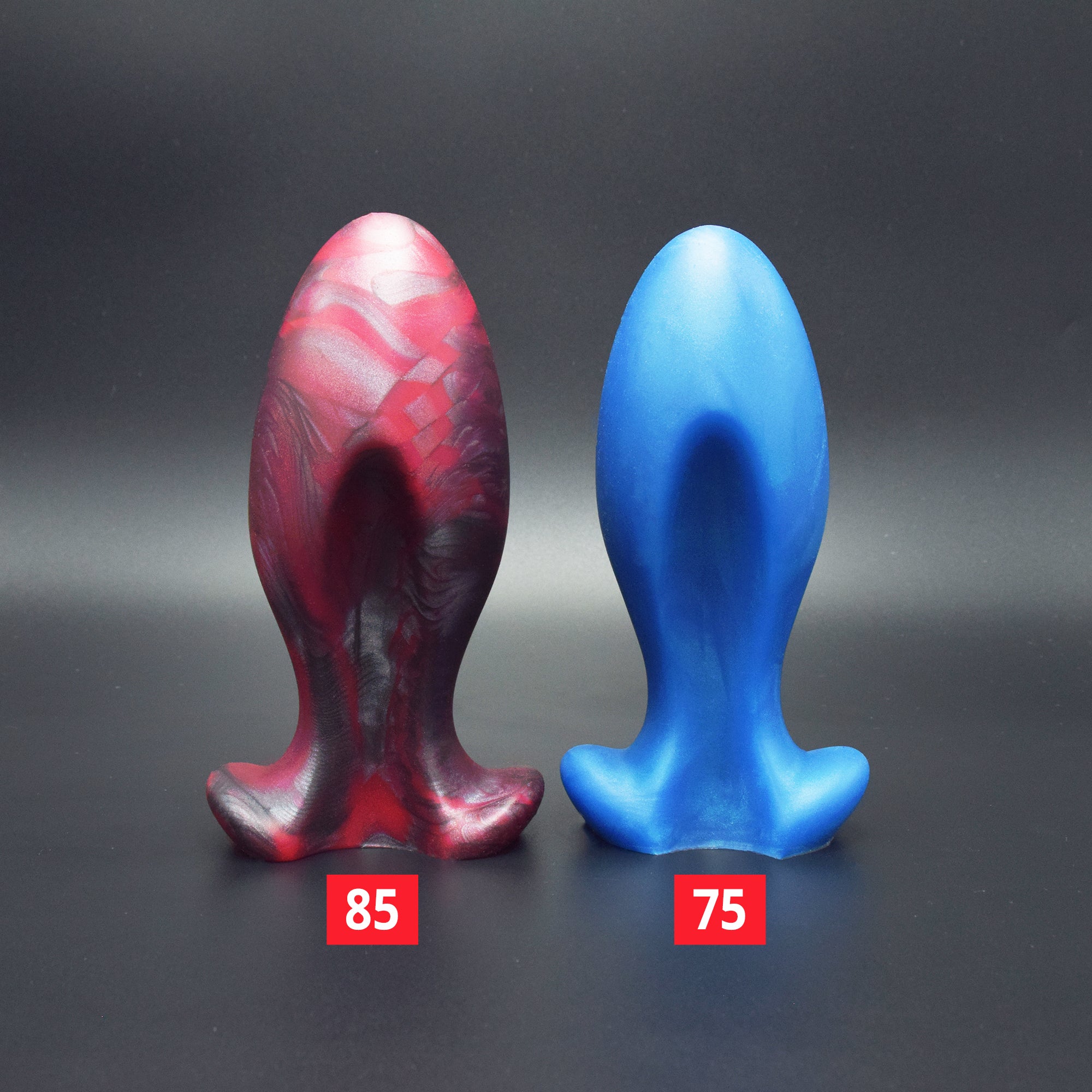 Chute 85 in Forge Red and Chute 75 in Blue Steel facing forward, beside each other for scale