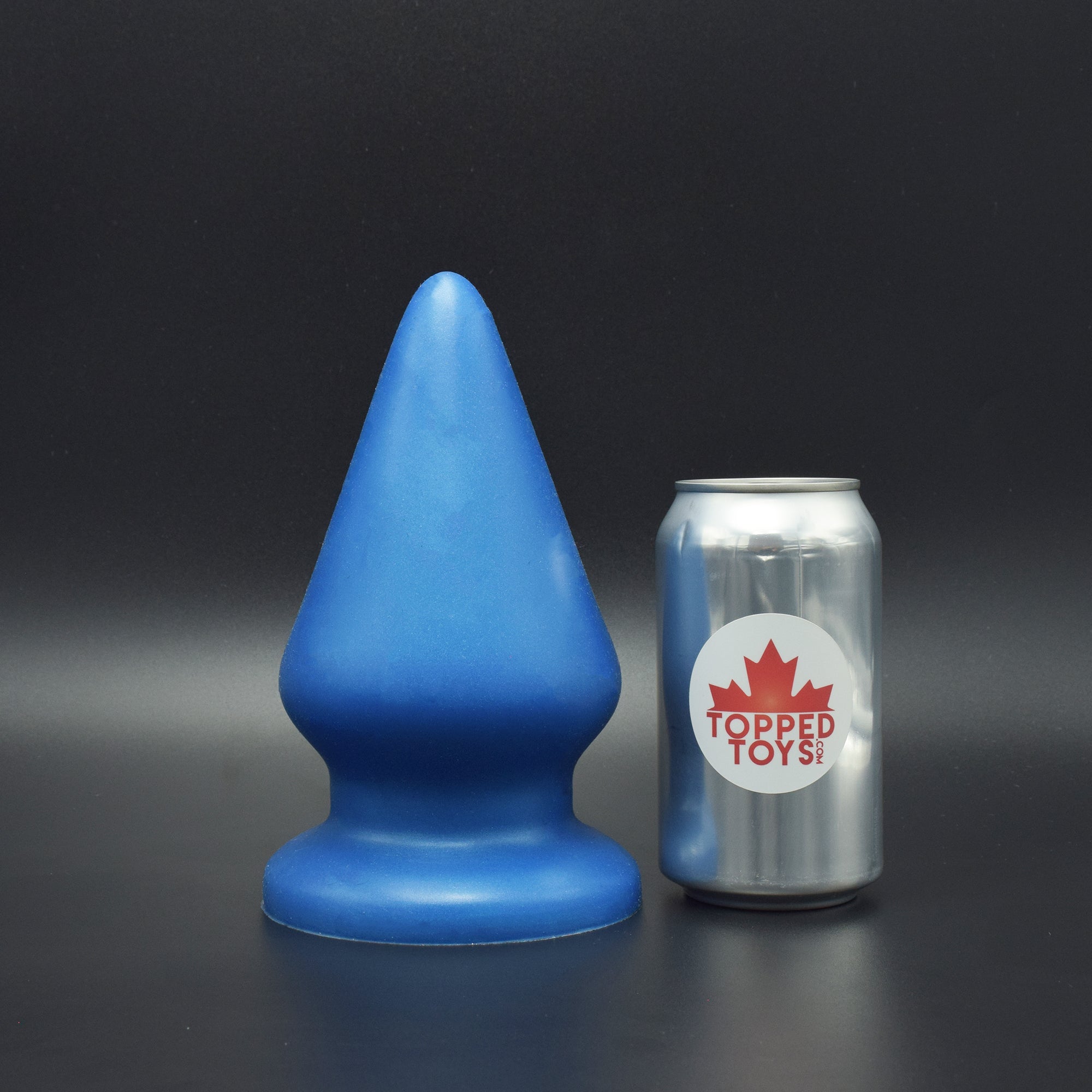 Grip 126 in Blue Steel, next to pop can with Topped Toys logo