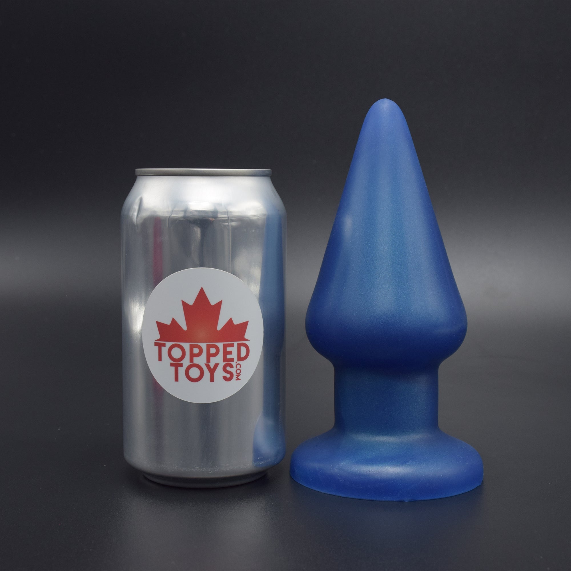 Grip 80 in Blue Steel, next to pop can with Topped Toys logo