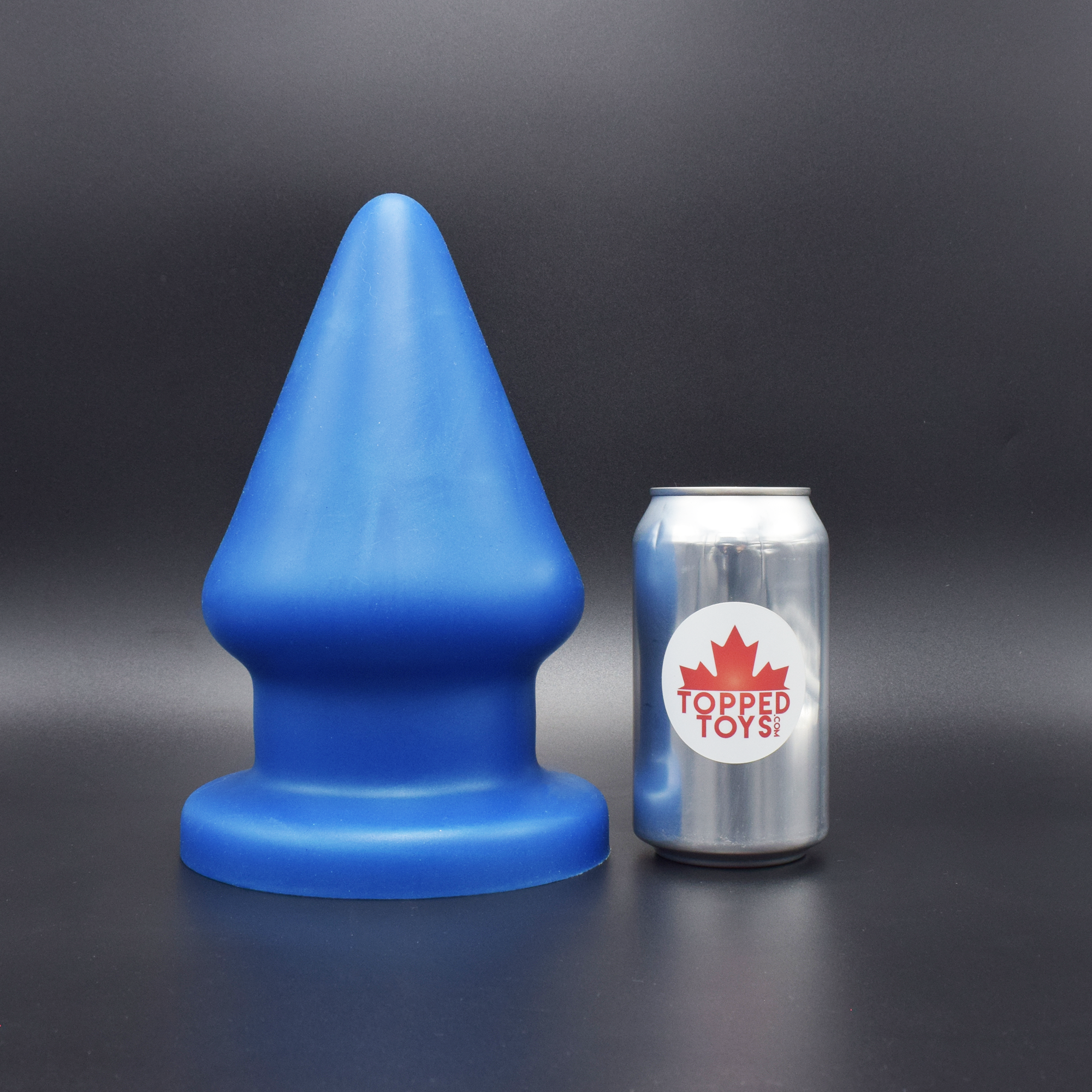Grip 160 in Blue Steel, next to pop can with Topped Toys logo