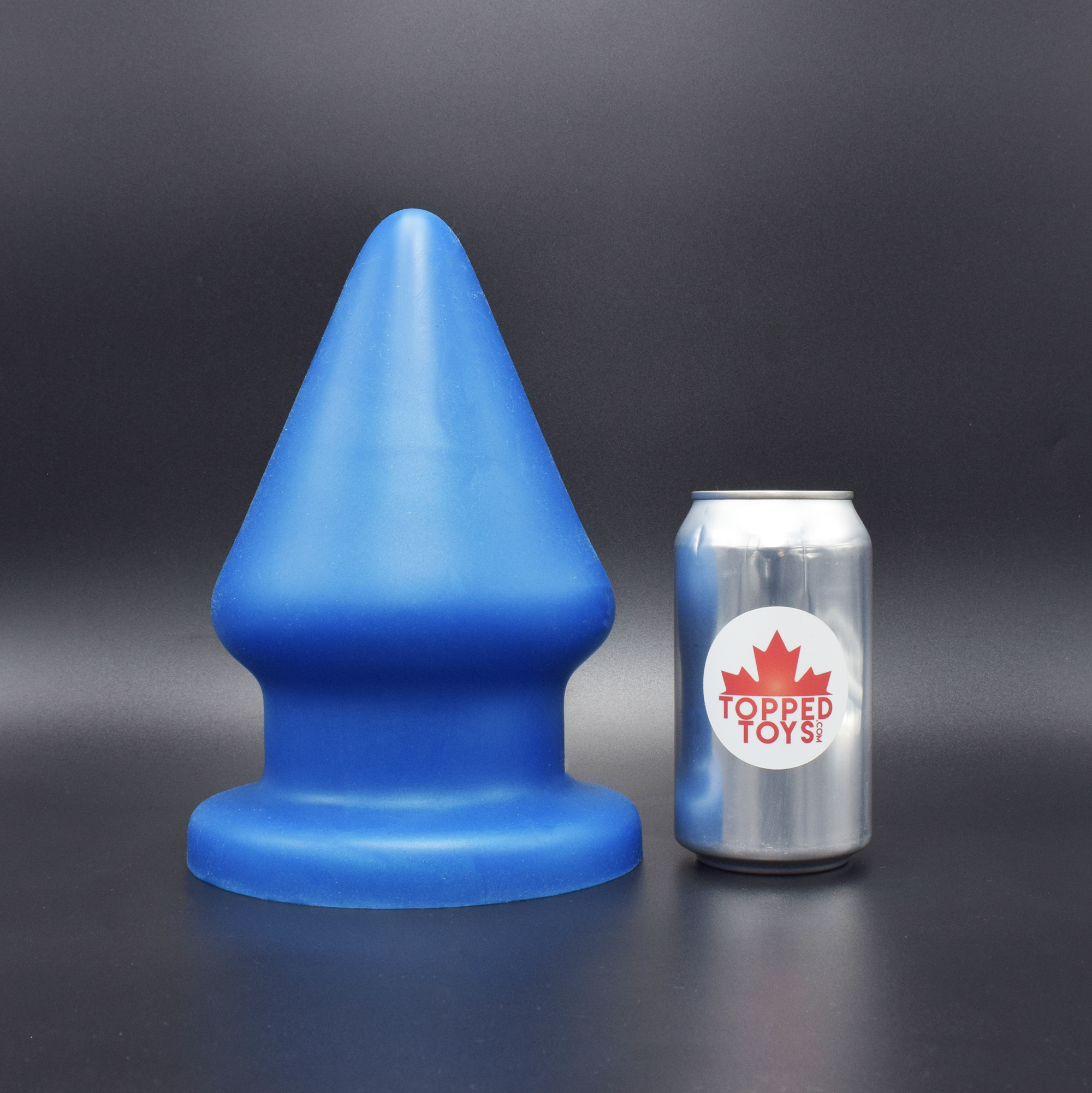 Grip 170 in Blue Steel, next to pop can with Topped Toys logo